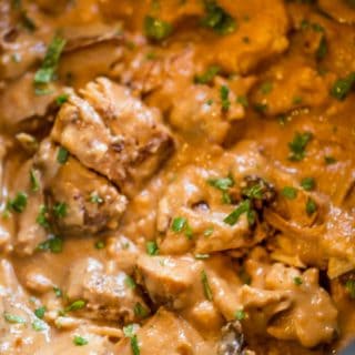 Slow Cooker Thai Peanut Chicken is an easy weeknight meal made with coconut milk, lime juice, peanut butter, ginger and garlic. Skip the delivery!